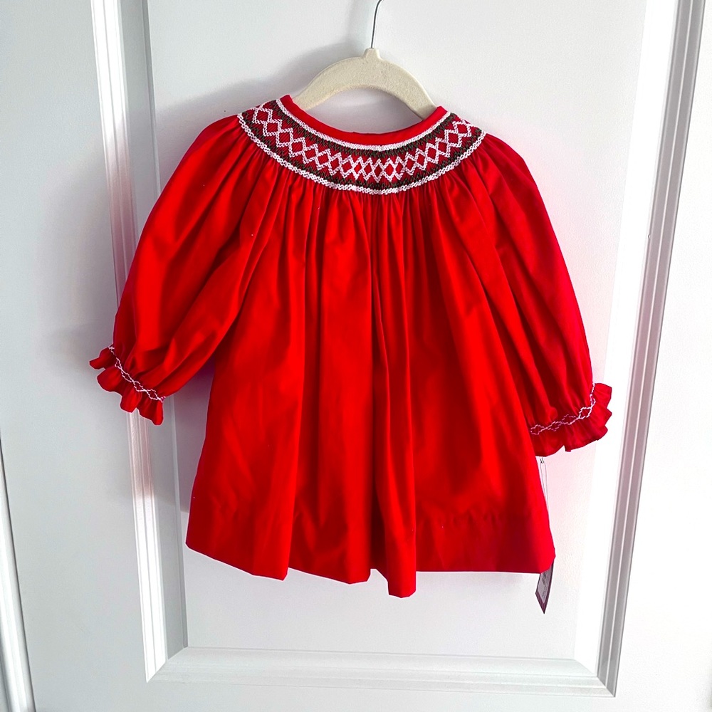 New with tags baby girls formal dress. Perfect for Christmas or holidays.